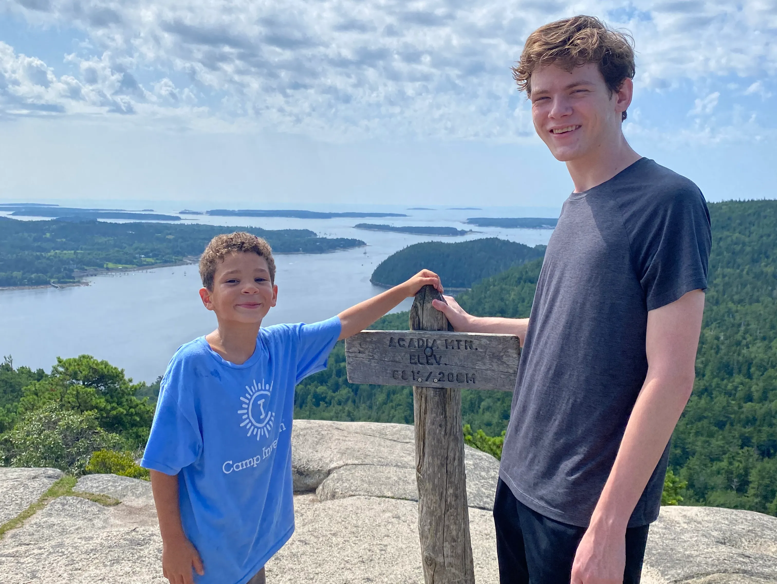 Two people at the summit of Acadia Mountain